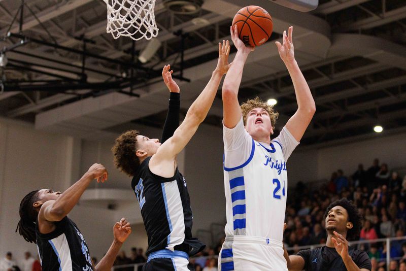 Marian's Prescott Horvath (24) shoots the ball during a boy's high school basketball game between Marian and Saint Joseph at Marian High School on Friday, Feb. 14, 2025, in Mishawaka.