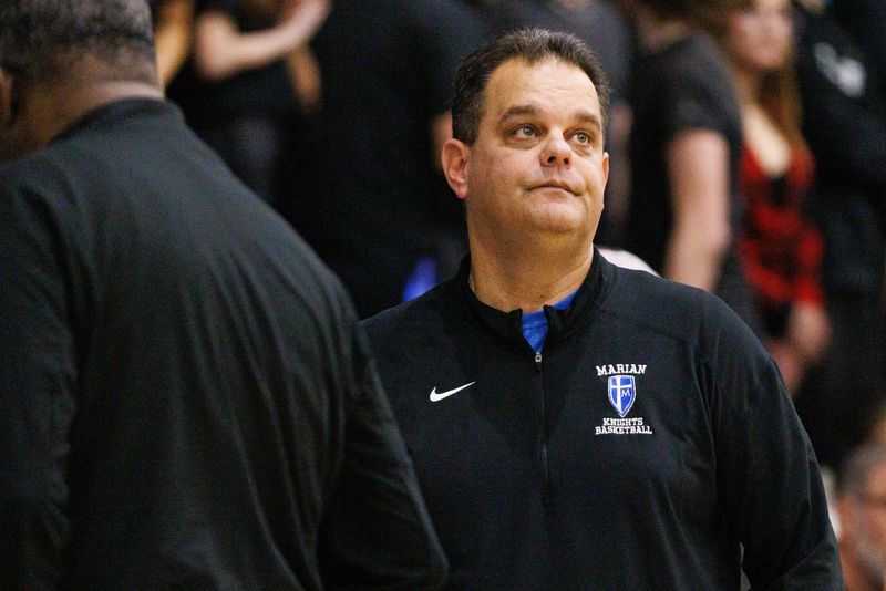 Marian's head coach Robb Berger looks on during a boy's high school basketball game between Marian and Saint Joseph at Marian High School on Friday, Feb. 14, 2025, in Mishawaka.