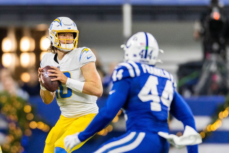 Dec 26, 2022; Indianapolis, Indiana, USA; Los Angeles Chargers quarterback Justin Herbert (10) drops back to pass the ball in the first half against the Indianapolis Colts at Lucas Oil Stadium. Mandatory Credit: Trevor Ruszkowski-USA TODAY Sports