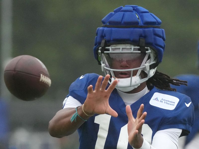 Indianapolis Colts wide receiver Adonai Mitchell (10) catches the ball during the Colts’ training camp Wednesday, Aug. 7, 2024, at Grand Park Sports Complex in Westfield.