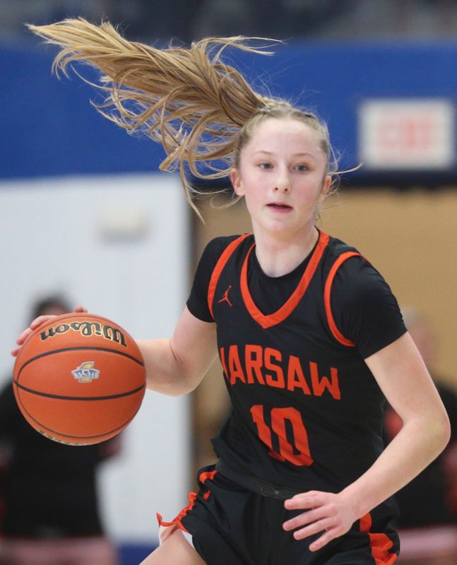 Warsaw Tigers guard Joslyn Bricker (10) drives to the basket Saturday, Feb. 22, 2025, during the IHSAA girls basketball semistate semifinal game against the McCutcheon Mavericks at Frankfort High School in Frankfort, Ind. Warsaw Tigers won 66-48.
