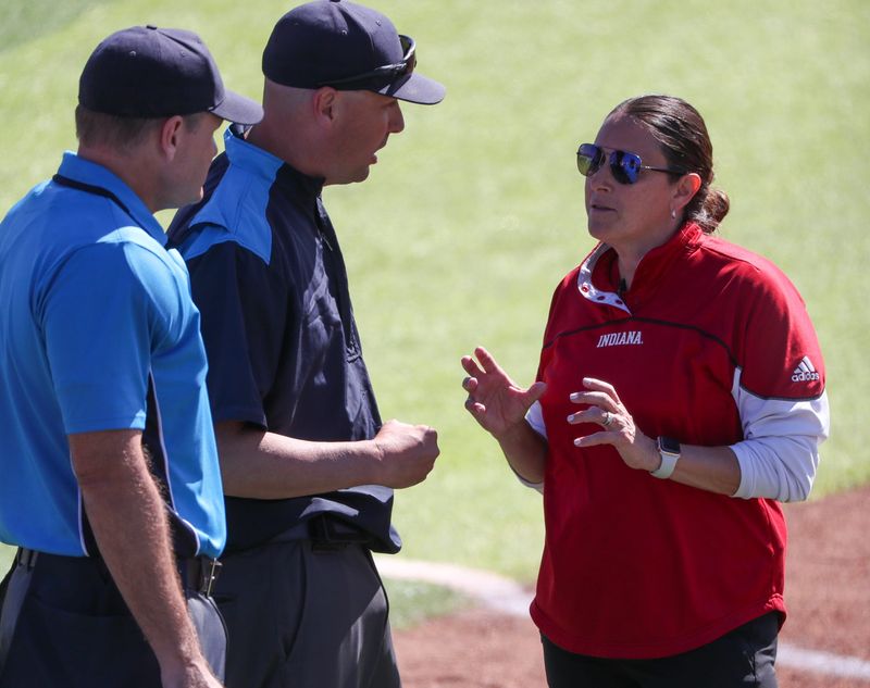 Indiana head coach Shonda Stanton speaks to umpires during a non-conference Division I softball game, Sunday, Feb. 23, 2025, at Rocky Johnson Field.