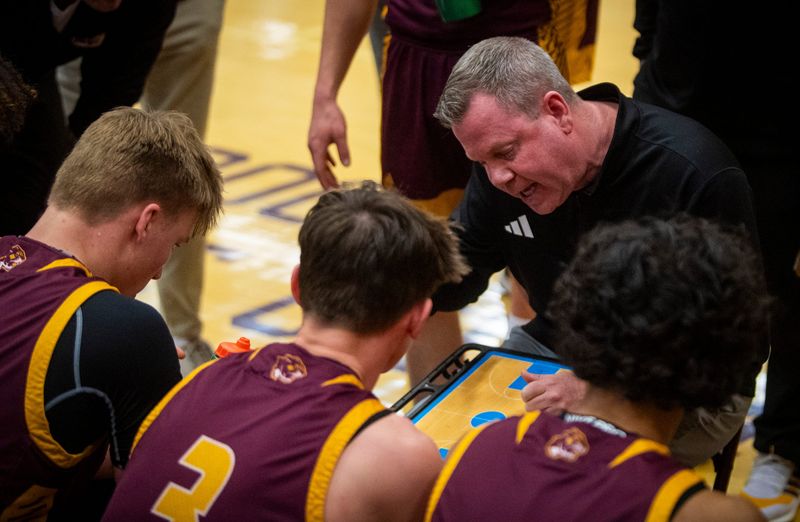 North Head Coach Jason Speer instructs his team during the Bloomington North versus Bloomington South boys IHSAA sectional basketball game at Bloomington High School South on Tuesday, March 4, 2025.