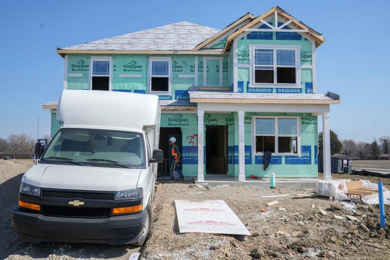 Construction on a model home Thursday, March 13, 2025, at new development Parkview Village in Cumberland.