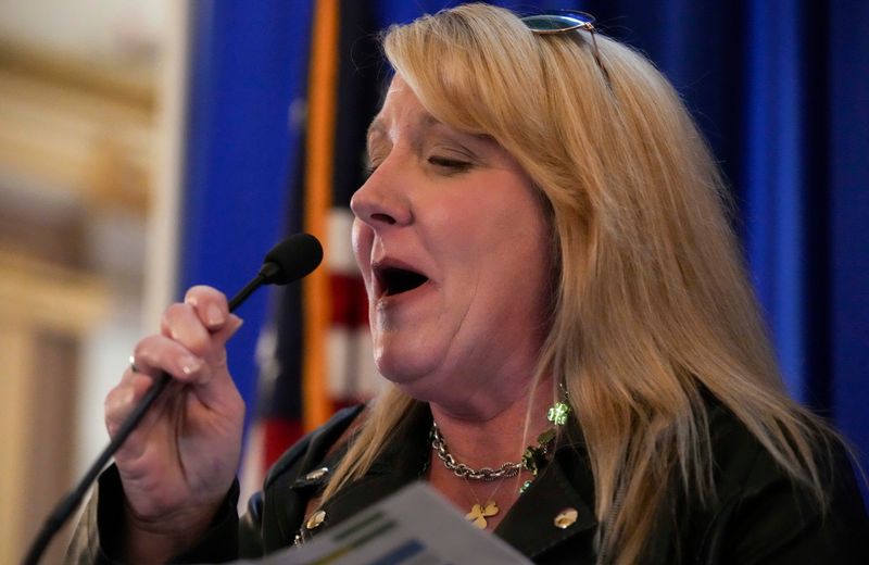 Conservative radio host Casey Daniels speaks during a rally for property tax reform Monday, March 17, 2025, at the Indiana Statehouse.