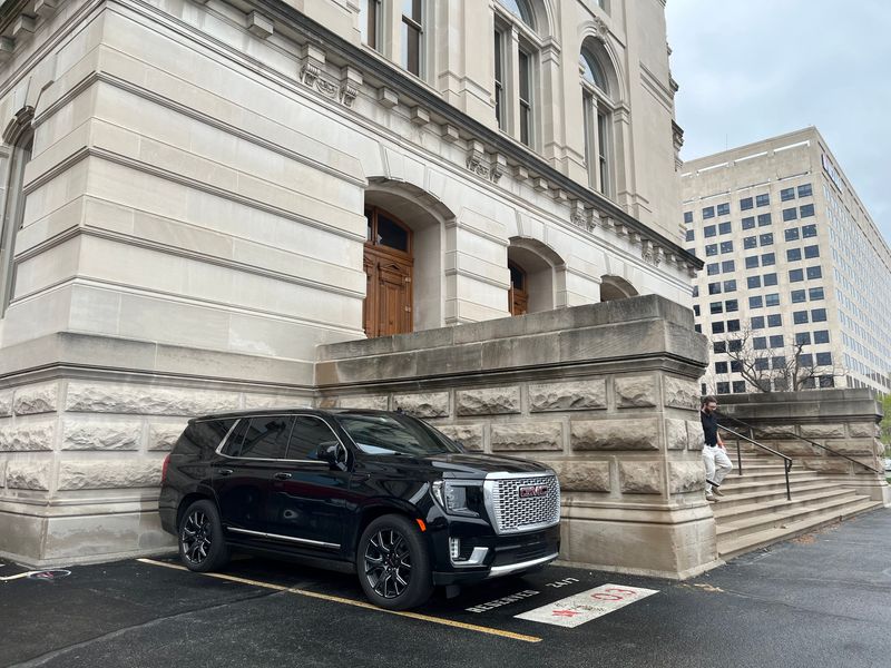 A Black Yukon Denali sits in the Statehouse parking lot. The Secretary of State’s Office spent more than $90,000 on the premium SUV which is driven by Diego Morales.
