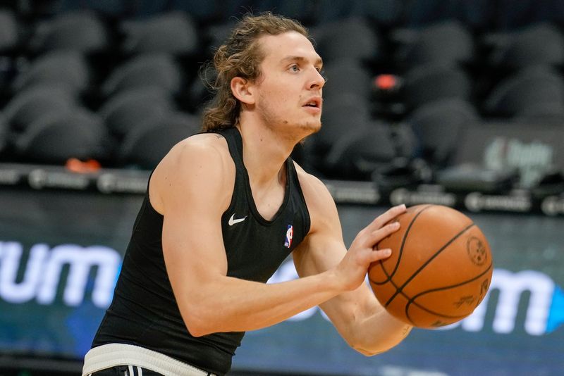 Feb 17, 2022; Charlotte, North Carolina, USA; Miami Heat guard Kyle Guy (5) during warms up before a game against the Charlotte Hornets at the Spectrum Center. Mandatory Credit: Jim Dedmon-USA TODAY Sports