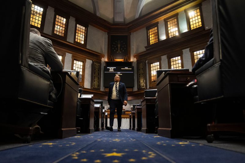 Sen. Mark Spencer, D-Gary, walks down the senate chamber Thursday, April 24, 2025, during the legislative session at the Indiana State Capitol in Indianapolis.