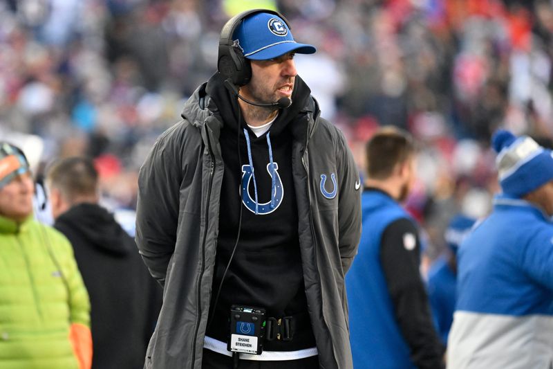Dec 1, 2024; Foxborough, Massachusetts, USA; Indianapolis Colts head coach Shane Steichen works form the sideline during the first half against the Indianapolis Colts at Gillette Stadium. Mandatory Credit: Eric Canha-Imagn Images