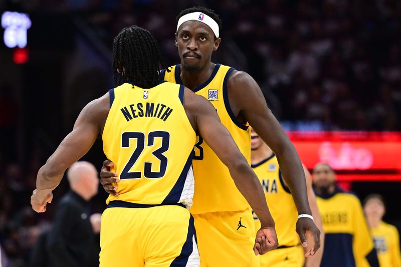 May 4, 2025; Cleveland, Ohio, USA; Indiana Pacers forward Pascal Siakam (43) celebrates with forward Aaron Nesmith (23) during the second half against the Cleveland Cavaliers in game one of the second round for the 2025 NBA Playoffs at Rocket Arena. Mandatory Credit: Ken Blaze-Imagn Images