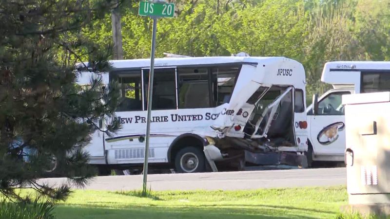 This photo provided by WNDU-TV shows the scene of a four-vehicle crash May 8, 2025, at the intersection of U.S. 20 and Fail Road in Kankakee Township in LaPorte County. Two New Prairie United School Corporation buses carrying coaches and students with New Prairie High School's junior varsity baseball team were hit in the crash, and two coaches and seven athletes were injured. The driver of a commercial box truck, Shawn Wesly Russell Akison, 41, of Romeoville, Illinois, was arrested at the scene in connection with the crash.
