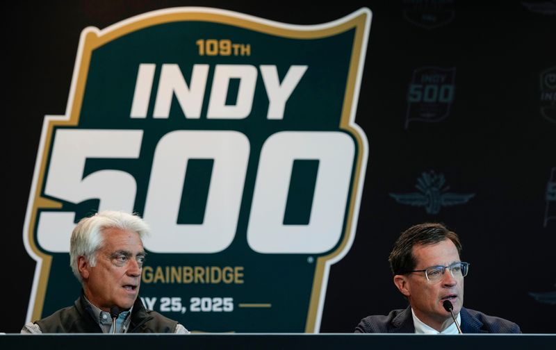 CEO of IndyCar and Penske Entertainment, Mark Miles (left) and Indianapolis Motor Speedway president Doug Boles make an announcement Friday, May 16, 2025, ahead of Fast Friday practice for the 109th running of the Indianapolis 500 at Indianapolis Motor Speedway.