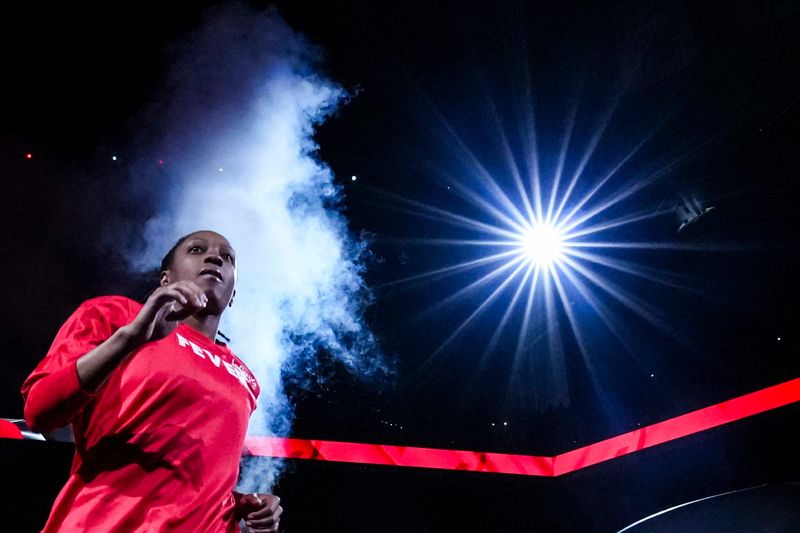 Indiana Fever guard Kelsey Mitchell (0) is introduced Saturday, May 17, 2025, during a game between the Indiana Fever and the Chicago Sky at Gainbridge Fieldhouse in Indianapolis.