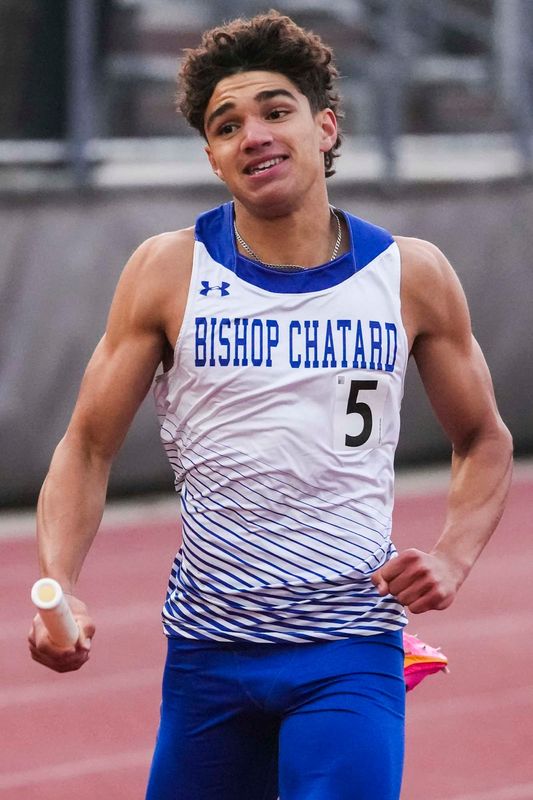 Bishop Chatard’s Phoenix Boyer finishes the 4x400-meter race Thursday, May 22, 2025, during a boys track and field sectionals meet at Lawrence Central in Indianapolis.