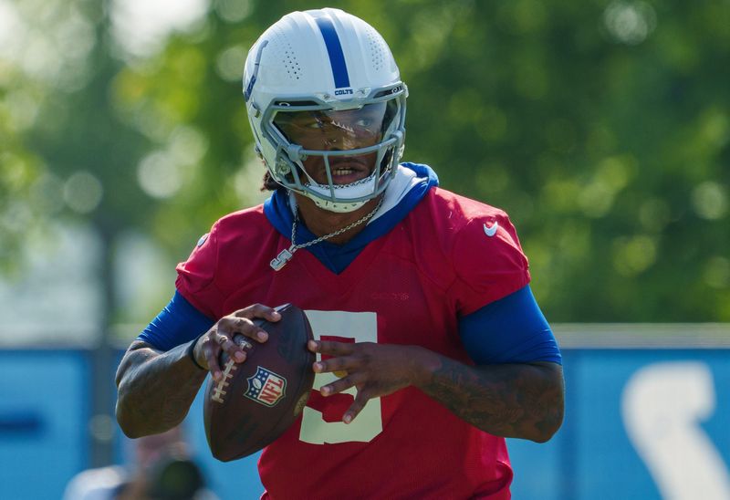 Jul 26, 2023; Westfield, IN, USA; Indianapolis Colts quarterback Anthony Richardson (5) works through drills during the first day of training camp practice at Grand Park Sports Campus. Mandatory Credit: Mykal McEldowney/IndyStar-USA TODAY Sports