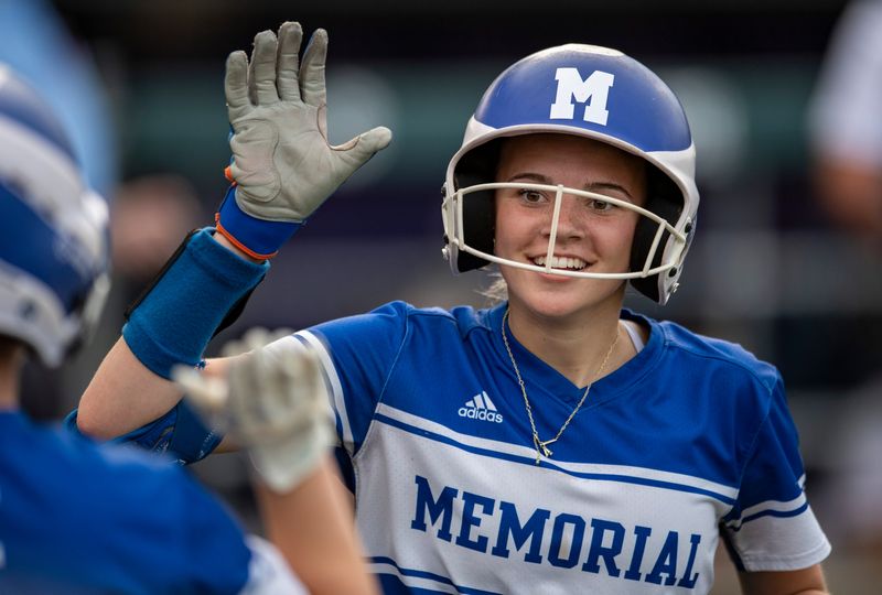 Memorial's Ann Blackburn (1) celebrates after a run as the Heritage Hills Patriots play the Memorial Tigers during the IHSAA Class 3A Softball Sectional semifinal at Cooper Stadium in Evansville, Ind., Wednesday, May 28, 2025.