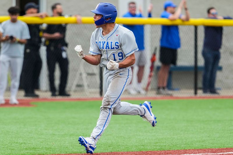 Hamilton Southeastern Royals infielder Jackson Bixler (19) celebrates while running to home plate Wednesday, May 28, 2025, during a Class 4A sectional game between the Fishers Tigers and the Hamilton Southeastern Royals at Carmel High School in Carmel.