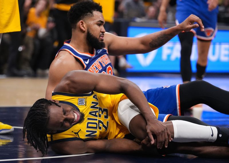 Indiana Pacers forward Aaron Nesmith (23) goes down with an injury Saturday, May 31, 2025, during the game at Gainbridge Fieldhouse in Indianapolis.
