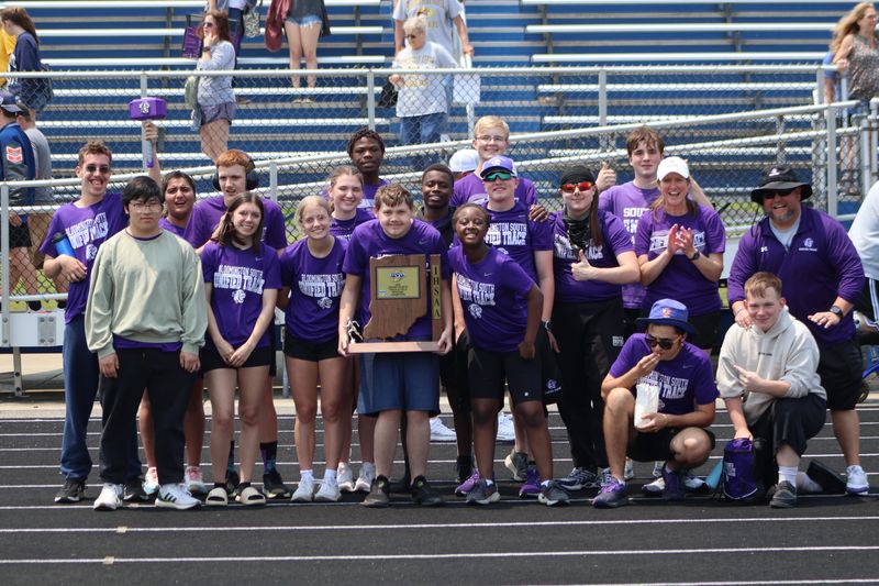 Members of the Bloomington South Unified Track Team post with the first regional trophy in school history after taking the title at Franklin on Saturday, May 31, 2025.