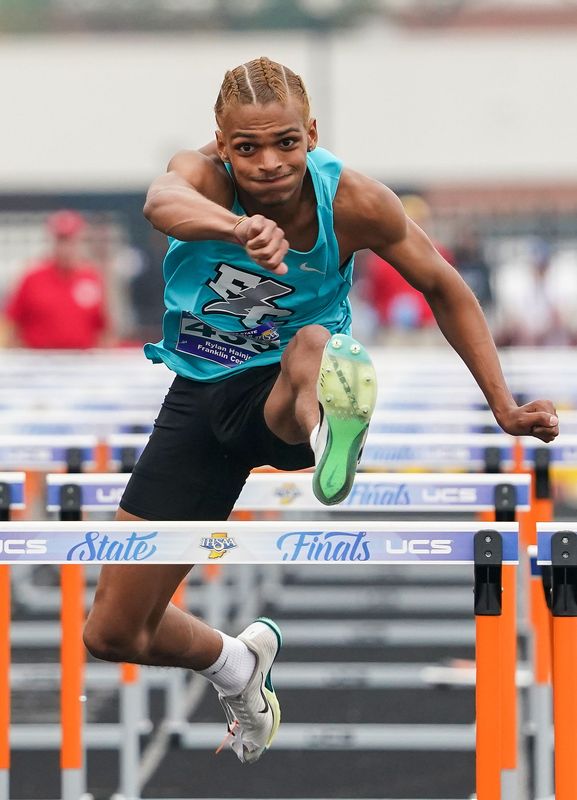 Franklin Central's Rylan Hainje competes in the 110 high hurdles on Friday, June 6, 2025, during the IHSAA 121st annual track and field state finals at North Central High School in Indianapolis.