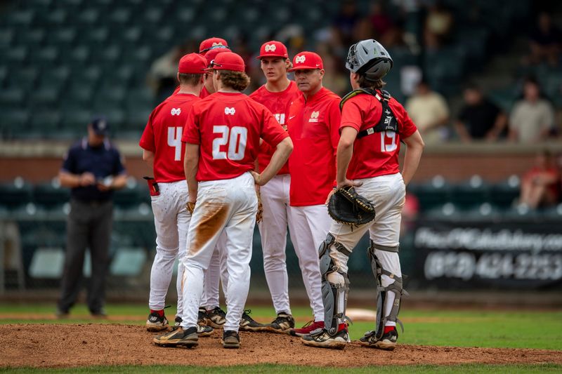 Mater Dei coach Adam Schiff gives instruction as the Mater Dei Wildcats play the Barr-Reeve Vikings during the IHSAA Class 2A Baseball Regional at Bosse Field in Evansville, Ind., Saturday, June 7, 2025.