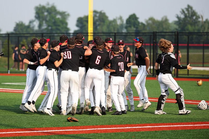 NorthWood players celebrate after the NorthWood-New Prairie high school 3A regional baseball game on Saturday, June 07, 2025, at NorthWood High School in Nappanee, Indiana.