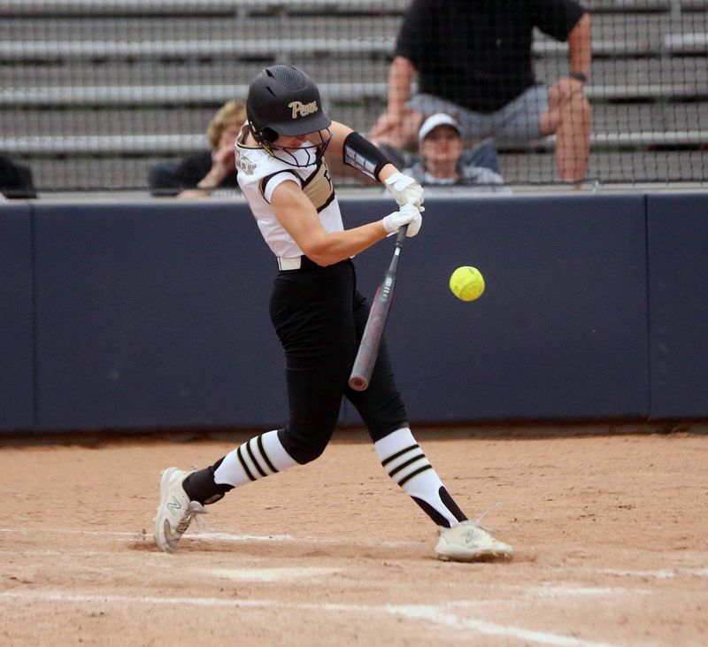 Penn junior Logan Rumble swings at a pitch during an IHSAA Class 4A softball semi-state championship game against Crown Point Saturday, June 7, 2025, at Harrison High School in West Lafayette.