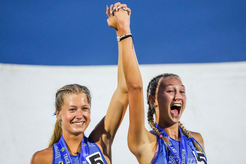 Hamilton Southeastern senior Chloe Senefeld (left) placed second in the 300 hurdles last season.