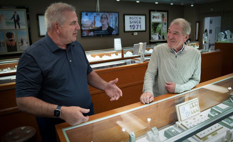 Brother’s Tom, left, and Mike Showalter, owners of the Miner’s Den Jewelry store in Royal Oak talk about the history of their store on Thursday, May 22, 2025. The price of gold is soaring as it hits $3,500 an ounce. The dust and debris leftover from cutting, filing and polishing jewelry during repairs can generate dust that adds up to thousands of dollars.