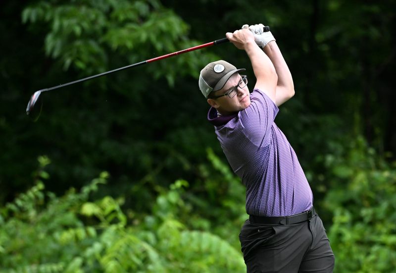 Bloomington South’s Colton Watson hits a tee shot during the IHSAA boys’ golf sectional at Cascades Golf Course on Monday, June 9, 2025.