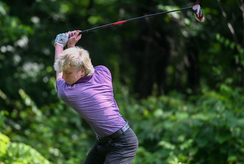 Bloomington South’s Aidan Bomba lines up a tee shot during the IHSAA boys’ golf sectional at Cascades Golf Course on Monday, June 9, 2025.