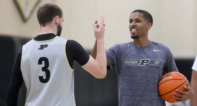 Purdue Boilermakers guard Braden Smith (3) high-fives Purdue Boilermakers graduate assistant Isaiah Thompson Monday, June 9, 2025, during practice at Cardinal Court in West Lafayette, Indiana.