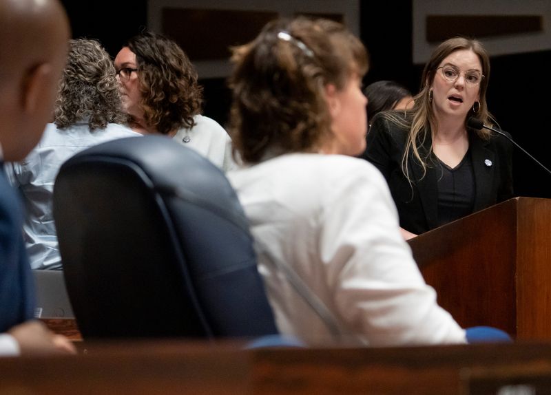 Lauren Roberts addresses the Indianapolis City-County Council Monday, June 9, 2025, during a City-County Council meeting in Indianapolis. Roberts is one of two women who alleges she was sexually harassed or assaulted by top Hogsett aide Thomas Cook and received messages from the mayor that she said made her uncomfortable.