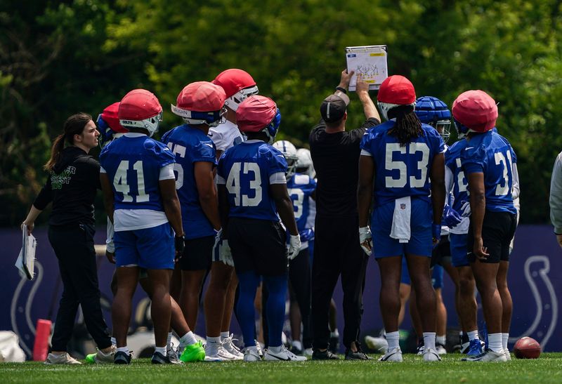 Indianapolis Colts players gather together Tuesday, June 10, 2025, during NFL Colts mandatory mini camp at the Indiana Farm Bureau Football Center in Indianapolis.
