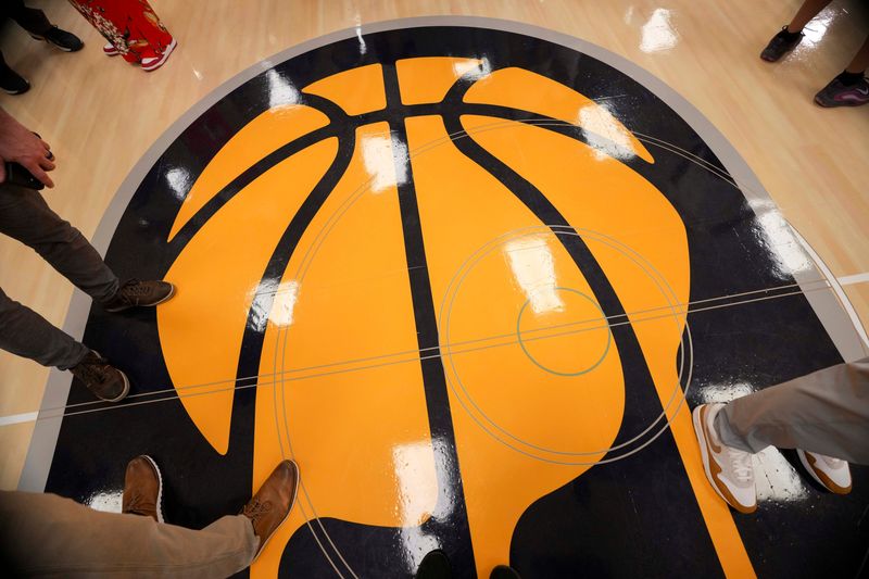 An Indiana Pacers logo sits on the floor following a ribbon cutting ceremony Thursday, June 12, 2025, at the Wheeler-Dowe Boys & Girls Club of Indianapolis. The club was renovated to include a new repurpose room that includes games and new technology as part of the NBA Cares Finals Legacy Projects.