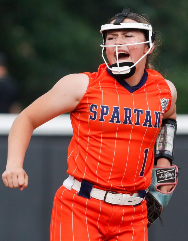 North Newton Spartans Caylee Oxley (1) celebrates after an out Friday, June 13, 2025, during the IHSAA Class 1A softball state championship against the Clay City Eels at Purdue University’s Bittinger Stadium in West Lafayette, Indiana. North Newton Spartans won 2-0.