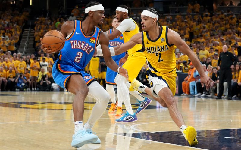 Indiana Pacers guard Andrew Nembhard (2) defends Oklahoma City Thunder guard Shai Gilgeous-Alexander (2) on Friday, June 13, 2025, during Game 4 of the NBA Finals at Gainbridge Fieldhouse in Indianapolis.