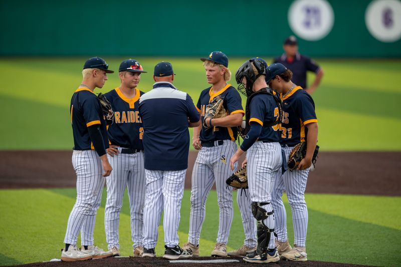 The Shenandoah Raiders gather on the mound as they play the Mater Dei Wildcats during the 2025 IHSAA Class 2A Baseball Semistate game at Braun Stadium in Evansville, Ind., Saturday, June 14, 2025.