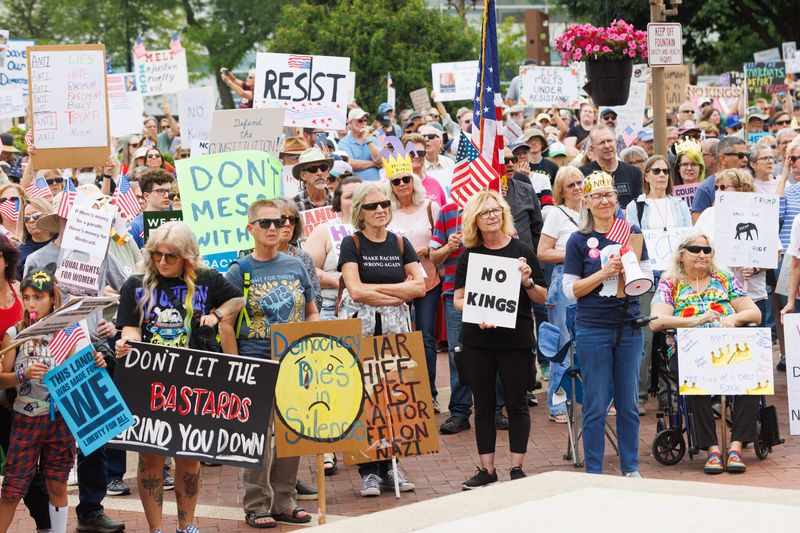 Thousands of protesters at Jon R. Hunt Memorial Plaza participate in the national No Kings rallies on Saturday, June 14, 2025, in South Bend, Indiana. The protests, organizers say, are meant to take “action to reject authoritarianism — and show the world what democracy really looks like.”