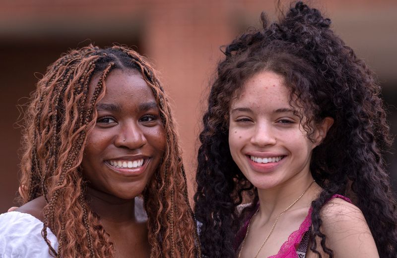 Varda Coleman, left, and Sophia Jallow helped organize Carmel’s very first Juneteenth celebration, which will take place Thursday, June 19, 2025. The 2025 Carmel High School graduates were members of the school’s Black Student Alliance which worked to put on the event. Photo taken Tuesday, June 17, 2025.