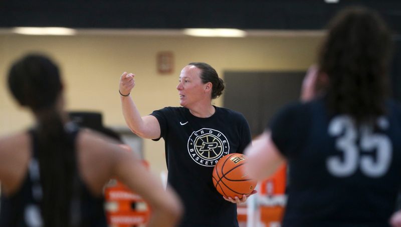 Purdue Boilermakers head coach Katie Gearlds gives drill instructions Thursday, June 19, 2025, during practice at Purdue University’s Cardinal Court in West Lafayette, Indiana.