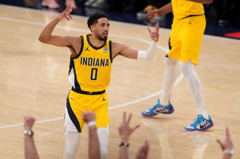 Indiana Pacers guard Tyrese Haliburton (0) reacts after shooting and making a three point basket Thursday, June 19, 2025, during Game 6 of the NBA Finals at Gainbridge Fieldhouse in Indianapolis.