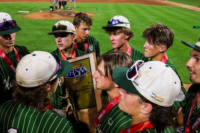 Evansville North holds the second plate trophy Saturday, June 21, 2025, during the Class 4A state championship game between Valparaiso and Evansville North at Victory Field in Indianapolis. Valparaiso defeated Evansville North, 5-0.