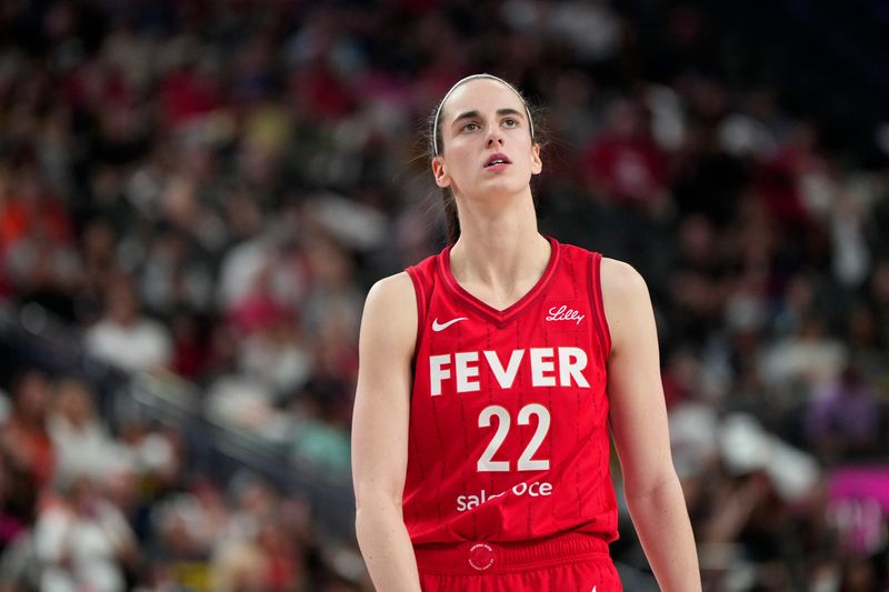 Jun 22, 2025; Las Vegas, Nevada, USA; Indiana Fever guard Caitlin Clark (22) during the during the first half of a WNBA basketball game against the Las Vegas Aces at T-Mobile Arena. Mandatory Credit: Lucas Peltier-Imagn Images