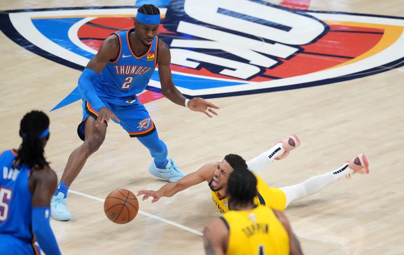 Indiana Pacers guard Tyrese Haliburton (0) goes down in pain Sunday, June 22, 2025, during Game 7 of the NBA Finals at Paycom Center in Oklahoma City.