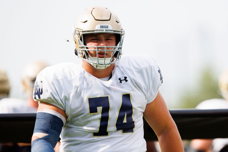 Notre Dame offensive lineman Billy Schrauth participates in a drill during a Notre Dame football practice at Irish Athletic Center on Tuesday, Aug. 6, 2024, in South Bend.