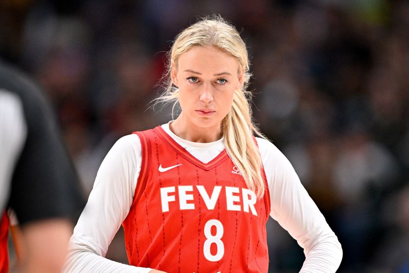 Jun 27, 2025; Dallas, Texas, USA; Indiana Fever guard Sophie Cunningham (8) looks on during the second half against the Dallas Wings at the American Airlines Center. Mandatory Credit: Jerome Miron-Imagn Images
