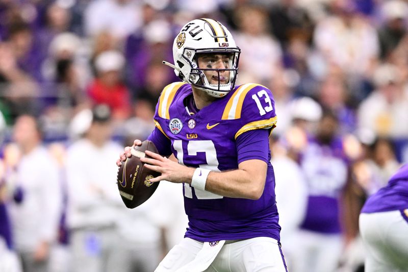 Dec 31, 2024; Houston, TX, USA; LSU Tigers quarterback Garrett Nussmeier (13) throws a pass during the first half against the Baylor Bears at NRG Stadium. Mandatory Credit: Maria Lysaker-Imagn Images