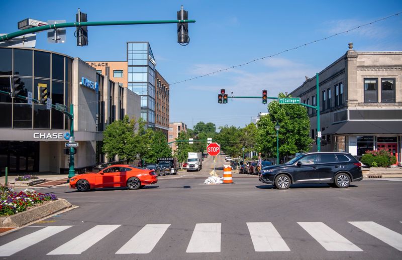 Cars head through the intersection of College and Kirkwood avenues, which is currently controlled by a stop sign making the intersection a three-way stop on Thursday, July 3, 2025.