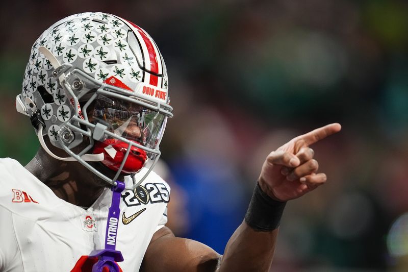 Ohio State Buckeyes safety Caleb Downs (2) warms up prior to the College Football Playoff National Championship against the Notre Dame Fighting Irish at Mercedes-Benz Stadium in Atlanta on Jan. 22, 2025.